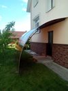 пристеновой арочный козырёк